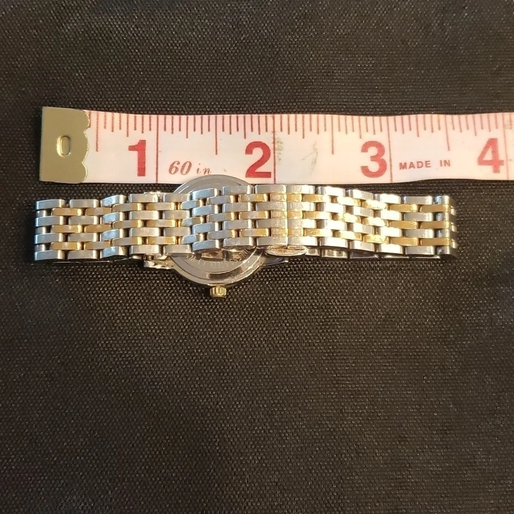 Raymond  Weil Toccata woman's watch with pearl face and Diamond accents.